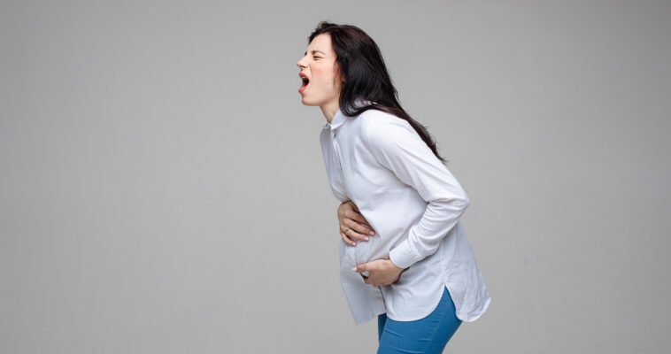 Болить шлунок при вагітності: причини, симптоми, та як полегшити біль