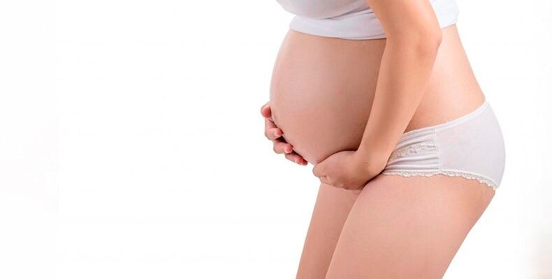Ріжучий біль внизу живота зліва при вагітності: причини та лікування